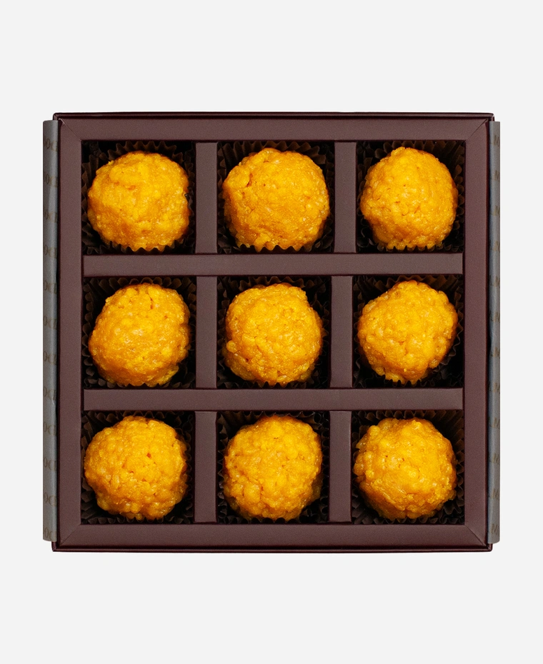 Classic Boondi Ladoo gift box, 9 pieces, open: golden boondi ladoo in a burgundy box with gold foil lettering.