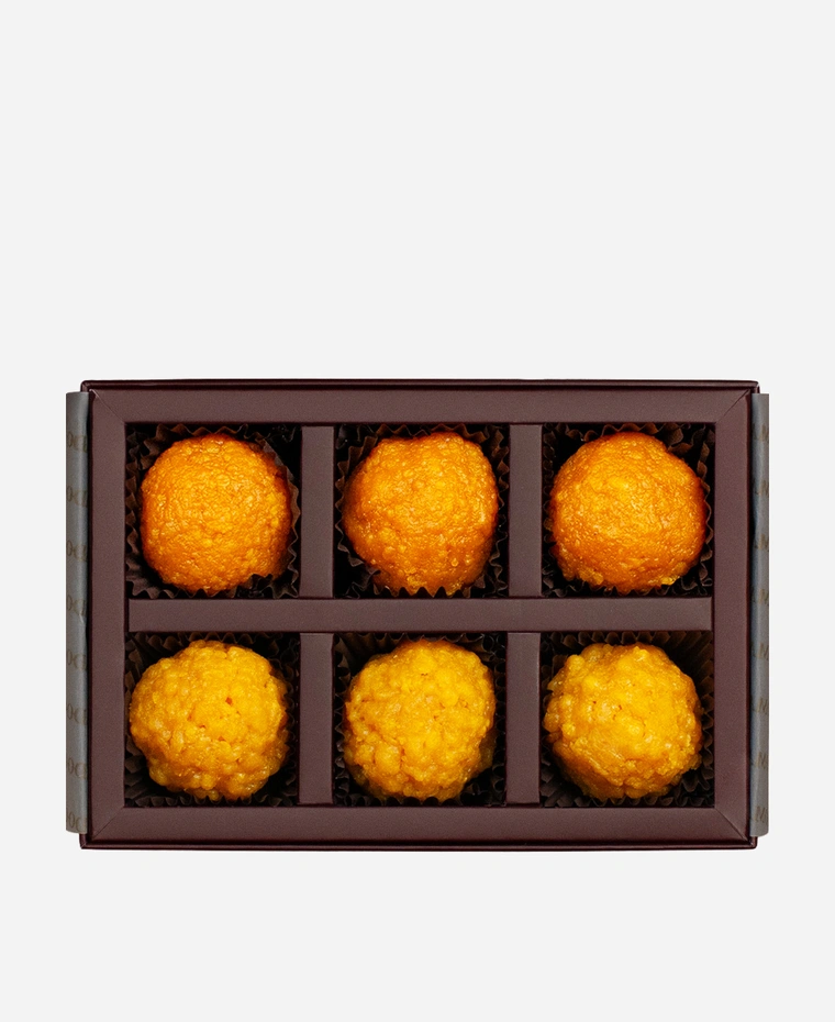 Classic Ladoo Selection gift box, 6 pieces, open: boondi and motichoor ladoo in a burgundy box with gold foil lettering.