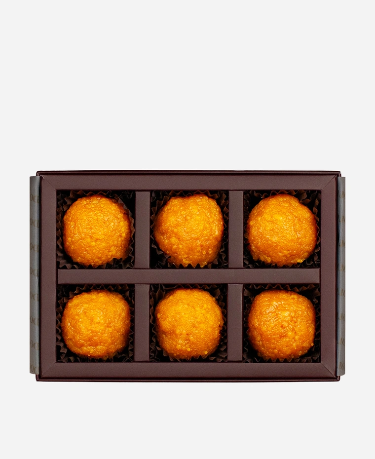Classic Motichoor Ladoo gift box, 6 pieces, open: fine-grained motichoor ladoo in a burgundy box with gold foil lettering.