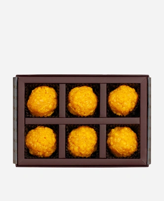 Classic Boondi Ladoo gift box, 6 pieces, open: golden boondi ladoo in a burgundy box with gold foil lettering.