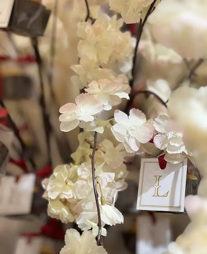 Ladoomail wedding favour tree in cherry blossom, with a monogrammed favour box and guest tag.