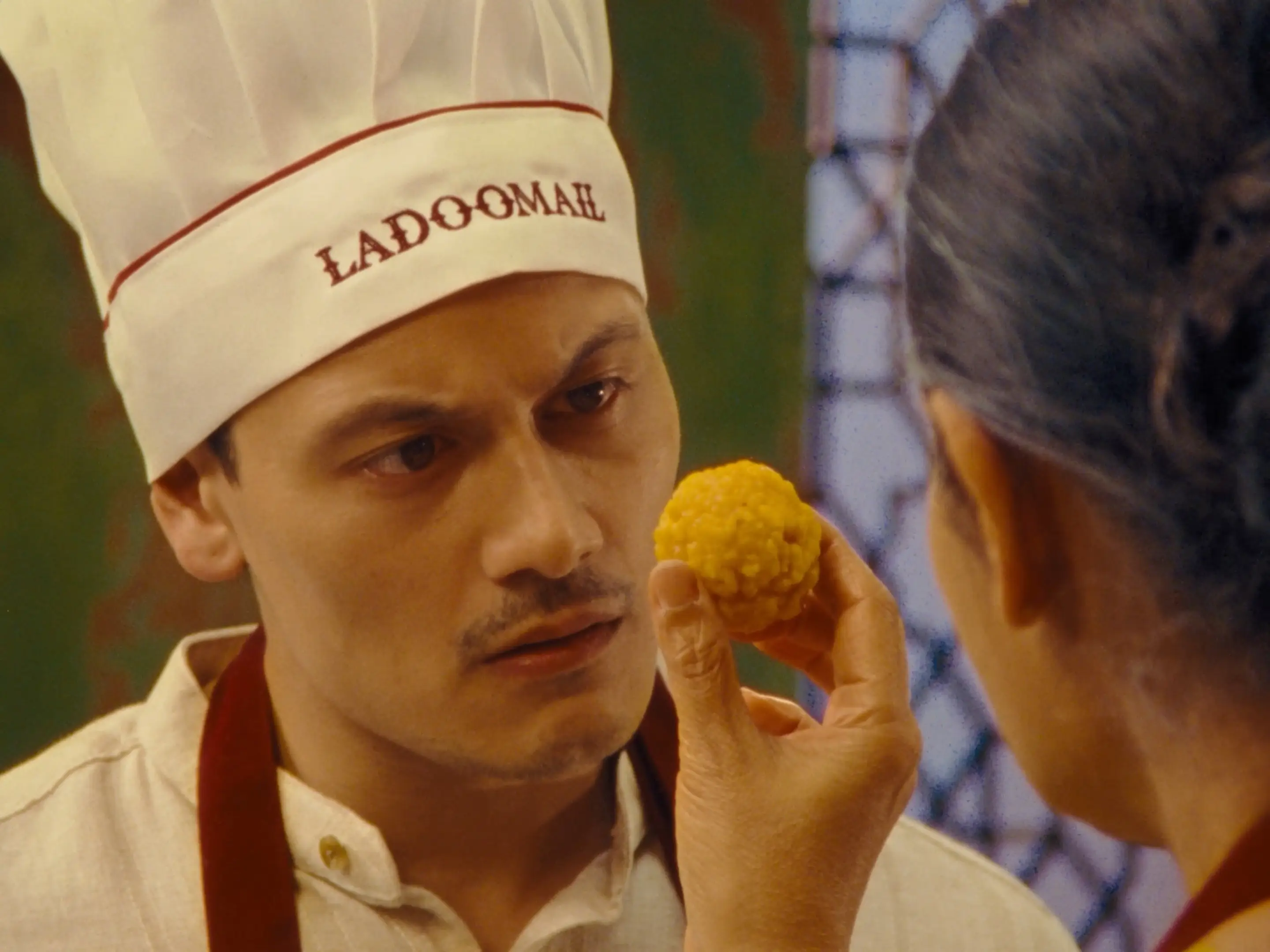Still from Ladoomail's 'New Order', a 16mm brand film.